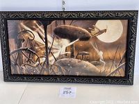Frontal photo of framed fairy print "Chasing the Moon" by David Delamare showing full artwork and frame details.