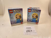 Two Lego Brick Headz Elsa sets in unopened original boxes, front view showing character image and Brick Headz branding.