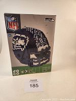Front view of FOCO BRXLZ Seattle Seahawks helmet build kit box with NFL logo and helmet image