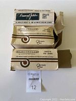 Original Electrolux branded boxes with marking of Save 'N' Pay Bank and model names Olympia One and Diamond Jubilee in slightly crushed condition.