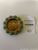 Front view of the jewelry tray showing the inscription 'New York World's Fair 1939' with jade bead border.