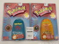 Two vintage factory sealed Pokémon Collector Marble Pouches in original packaging, one Vileplume and one Charmander.