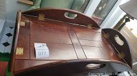 Photo of wooden serving tray table top with hinged sections and brass hinges