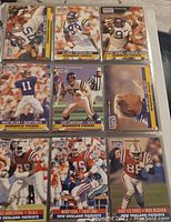 Nine football trading cards from 1991 NFL Pro Set laid out in a 3x3 grid, showing players from Minnesota Vikings and New England Patriots with clear images and names