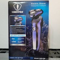 Front view of box showing the electric shaver image, product features including omni-directional floating shaving heads, body washable, USB and DC charging adaptors, and model number CWS-034.