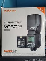 Front of the original product box showing the product image and branding for Godox V860 II S camera flash kit for Sony.