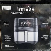Front view of the Innsky Air Fryer box showing product image and main features: one touch selections, 11 easy cooking presets, recipe book with 62 recipes.