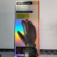 Front view of the packaged SabotHeat Battery Heated Gloves showing product image, brand, and features such as heating in 3 seconds, 10,000 heating cycles, and waterproof design.
