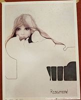 Close-up of the lithograph signature "Rosamond" and artwork details showing female portrait and foxing spots on paper.