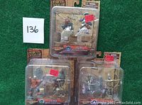 Three blister packs of Forces of Valor figures showing Pirates, Vikings, and Knights sets still sealed with price tags and labeled 136.