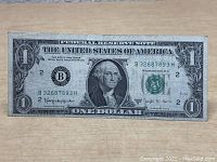 Front view of 1963 Barr Note one dollar bill, showing full bill and serial number B32687893H.