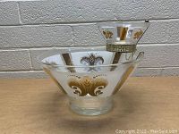 Photo of the glass chip and dip set showing both bowls and decorative motifs.