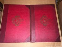Front covers of two red hardcover volumes showing Harper's Pictorial History of the Civil War titles and cover condition