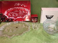 Photo showing all three items: Walther-Glas crystal tray with nature etching, Mikasa candle holder, and Gianna crystal bowl with boxes behind them