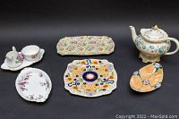 Overall lot view showing various English china servingware items including Royal Albert, Royal Stuart, and Sadler pieces