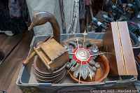 Photo showing the wooden mallard duck sculpture, walnut salad bowls stacked, wooden trivets, and the wooden box.