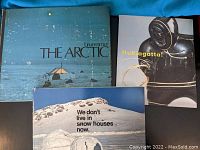 Three books related to the Arctic and Inuit culture with covers visible.