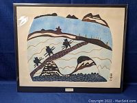 Framed print in protective sleeve showing full artwork and black frame