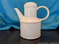 Front angled view of the Midwinter Stonehenge white coffee pot showing the handle, spout, and lid.