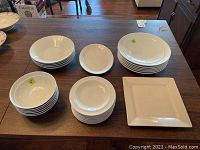 Top view of the full collection of dishes showing all sizes and platter types.