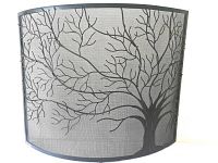 Front view of curved black steel fire screen with tree design showing full width and height.
