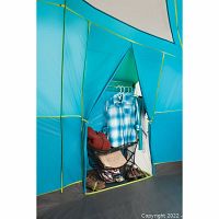 Interior view of built-in closet organizer with hanger bar, shelf and gear storage