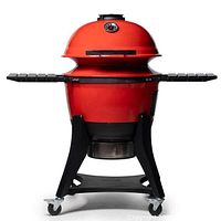 Full view of red ceramic kettle grill on black wheeled stand with side shelves folded down