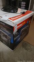 Photo of the sealed box showing brand and product type (SentrySafe File Safe)