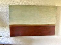 Full view of large rectangular oil painting in muted earthy tones, mounted on wall.