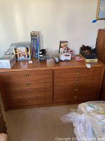 Front view showing full width and eight drawers