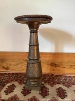 Front view of entire metal base with removable wood top in place