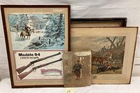 Framed Winchester Model 94 poster with two guns depicted alongside fox hunt print and colonial soldier portrait in front.