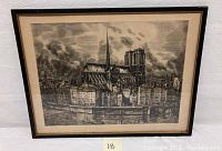 Framed etching print depicting Notre Dame cathedral and cityscape.