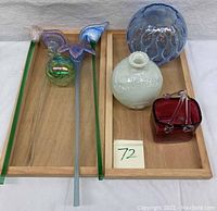 Blue witches ball glass float, opalescent flowers, milk glass vase, red glass vase on wooden trays, with tray not included note.