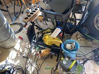 View of Black & Decker workbench frame and top with assorted tools around.
