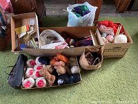 First photo showing a box and bags with multiple yarn skeins and balls of different colors, textures, and materials, along with a textured carrying bag.
