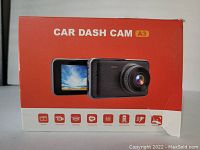 Front side of the box showing product image and name 'Car Dash Cam A3' with icons representing its features.