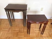 Photo shows both sets of nesting tables, 2-piece set on the right and 3-piece set on the left, with visible wear and traditional turned legs.