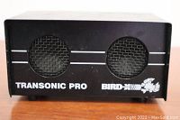 Front view of the Bird-X Transonic Pro ultrasonic pest repeller showing two circular speaker grills with mesh covers and white branding text and logo.