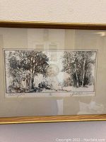 Framed and matted print titled 'Morning 1969' by Jack Orman hung on the wall