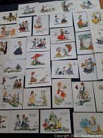 Photo showing a spread of 36 vintage Russian postcards, all featuring colorful folk-style watercolor illustrations depicting children, animals, and rural scenes.