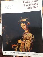 Front cover plate showing Rembrandt painting of a woman with flowers in her hair and robe, titled Rembrandt Harmensz van Rijn from The Hermitage Collections by Aurora Art Publishers.