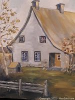 Close-up of painting illustrating house with dog house, tree, and white picket fence in a natural setting.