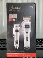 Front view of the boxed Hatteker Professional Hair Clipper and Trimmer set, showing the two devices and product name/model.