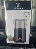 Front view of the Dr Mills Coffee Grinder box showing product image and brand name