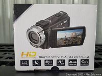 Box front showing image of black digital video camera recorder and highlighting features such as 16x digital zoom, night vision, anti-shake, 3 inch TFT screen, Full HD 1080p