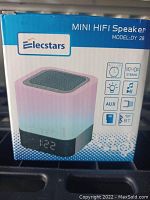Front image of the Elecstars Mini HiFi Speaker box showing the product image, brand, model number, and key features.