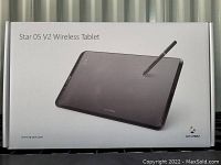 Front of box showing the XP-Pen Star 05 V2 Wireless Tablet with digital pen on top.