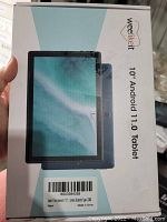 Front side of the tablet box showing tablet image and model details.