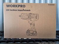 Photo showing front of the original box for Workpro 20V Cordless Impact Wrench with model number W125042AE and product illustration.